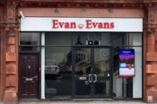 Storefront with "Evan Evans" signage.