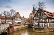 Historic European town with timber-framed buildings.