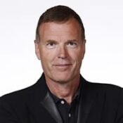 Portrait of a middle-aged man in black blazer