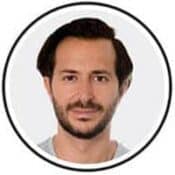 Man with a beard and short hair.
