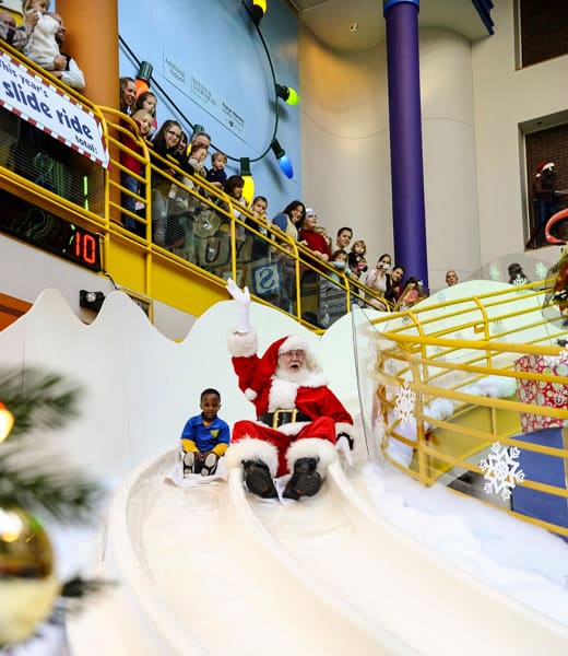 Santa has the faster inside track during Jolly Days at The Children’s Museum of Indianapolis. Photo courtesy Visit Indy