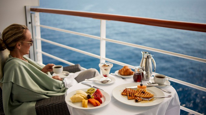Daily breakfast on the balcony is a happy ritual for many world cruisers. Photo courtesy Oceania Cruises
